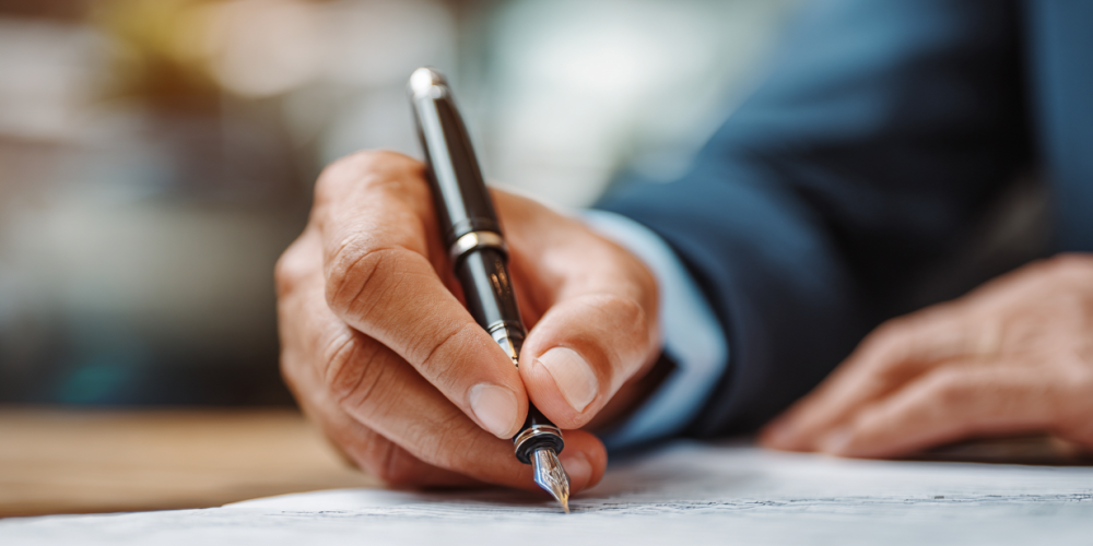 zmot_lab_photo-businessman-hand-and-writing-on-document-with-_e6717678-1315-4e03-b38f-89f11c439b3e_3